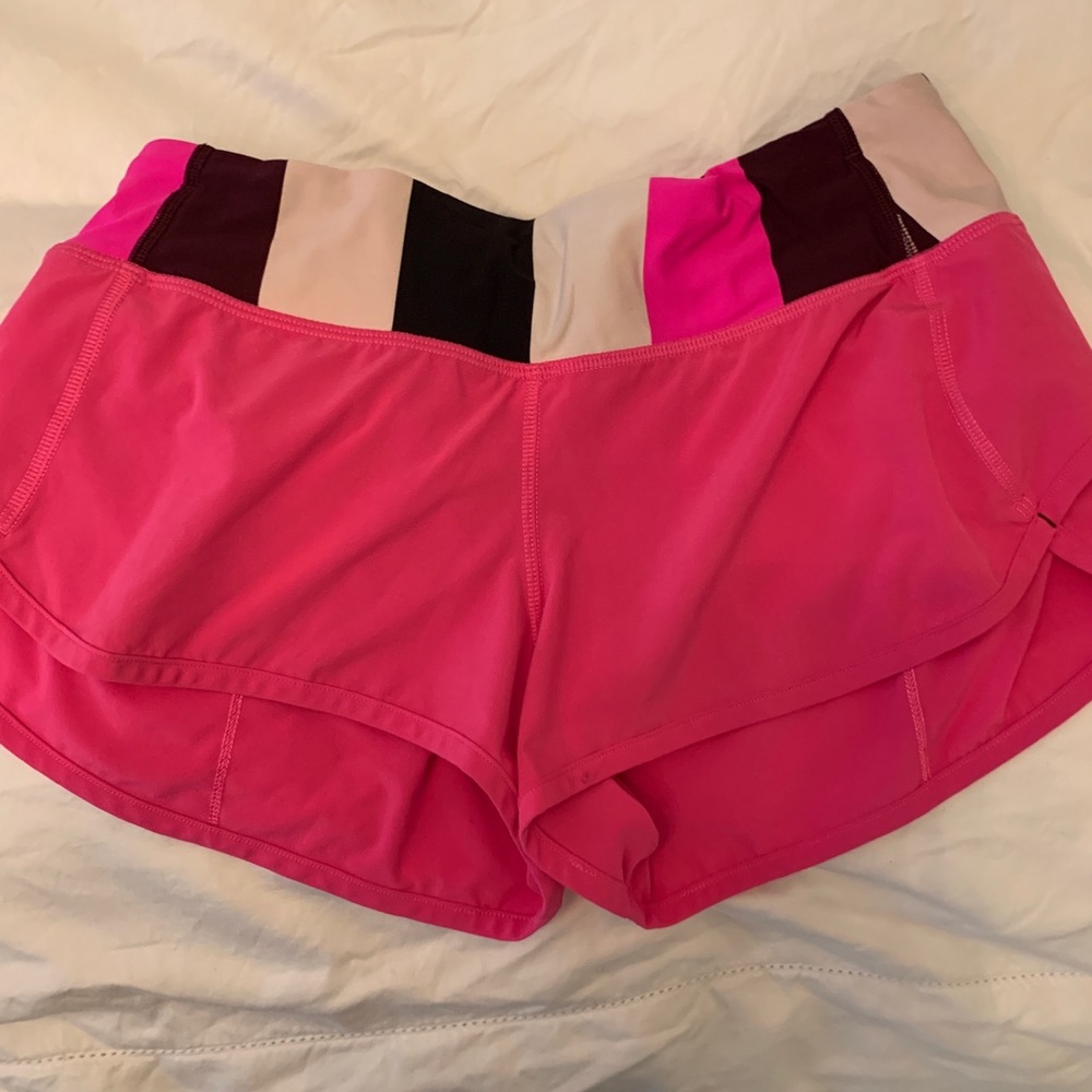 Pink lululemon running shorts
